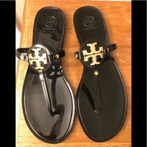 Never worn Tory Burch black and gold sandals